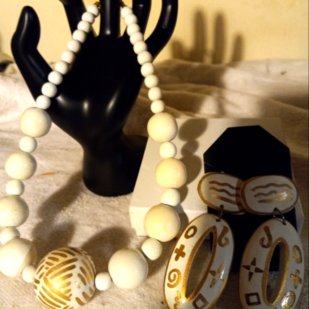Used,not new  wood large bead choker necklace &matching  pierced wood earrings.